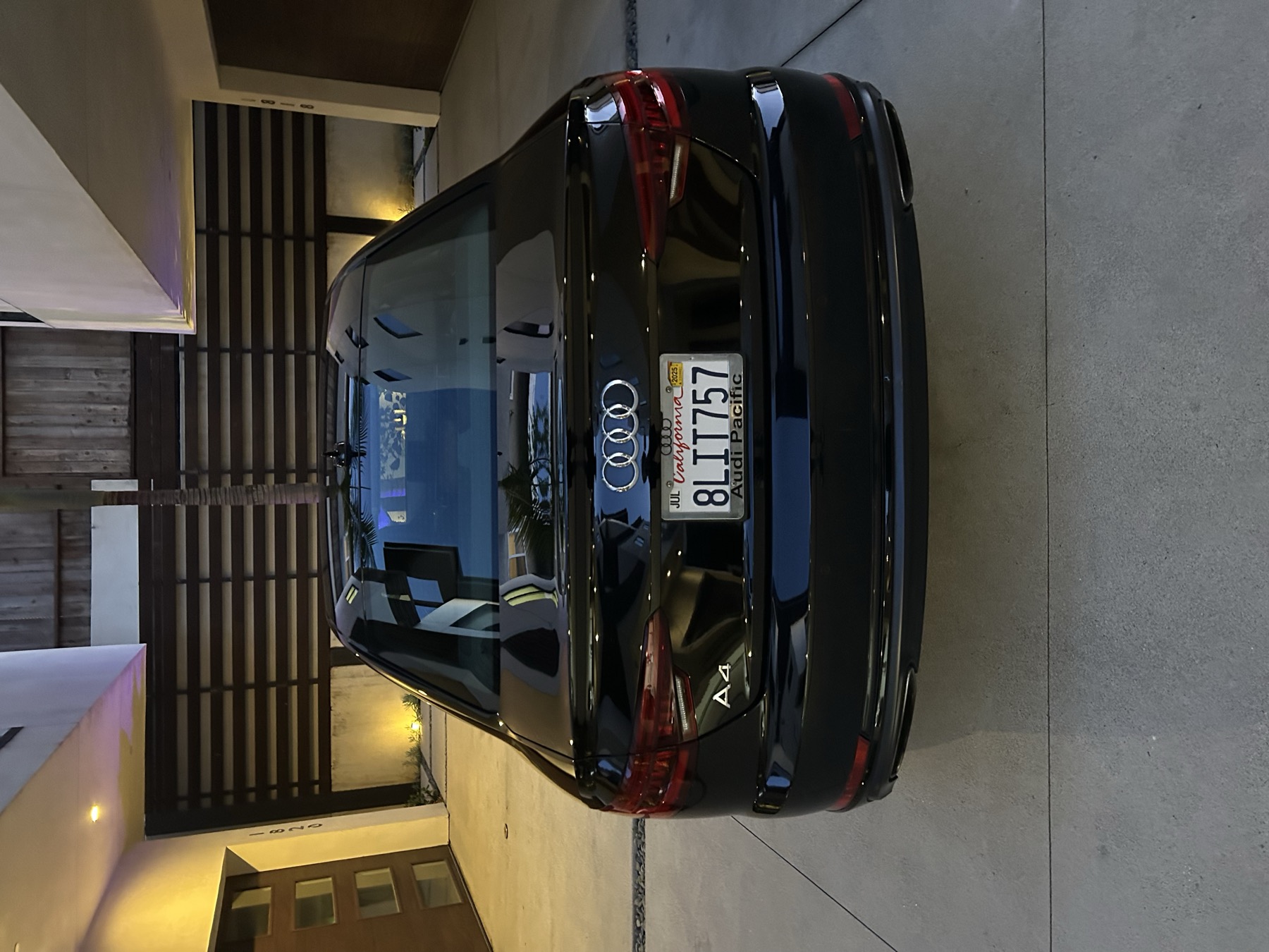 Black Audi rear view after detailing