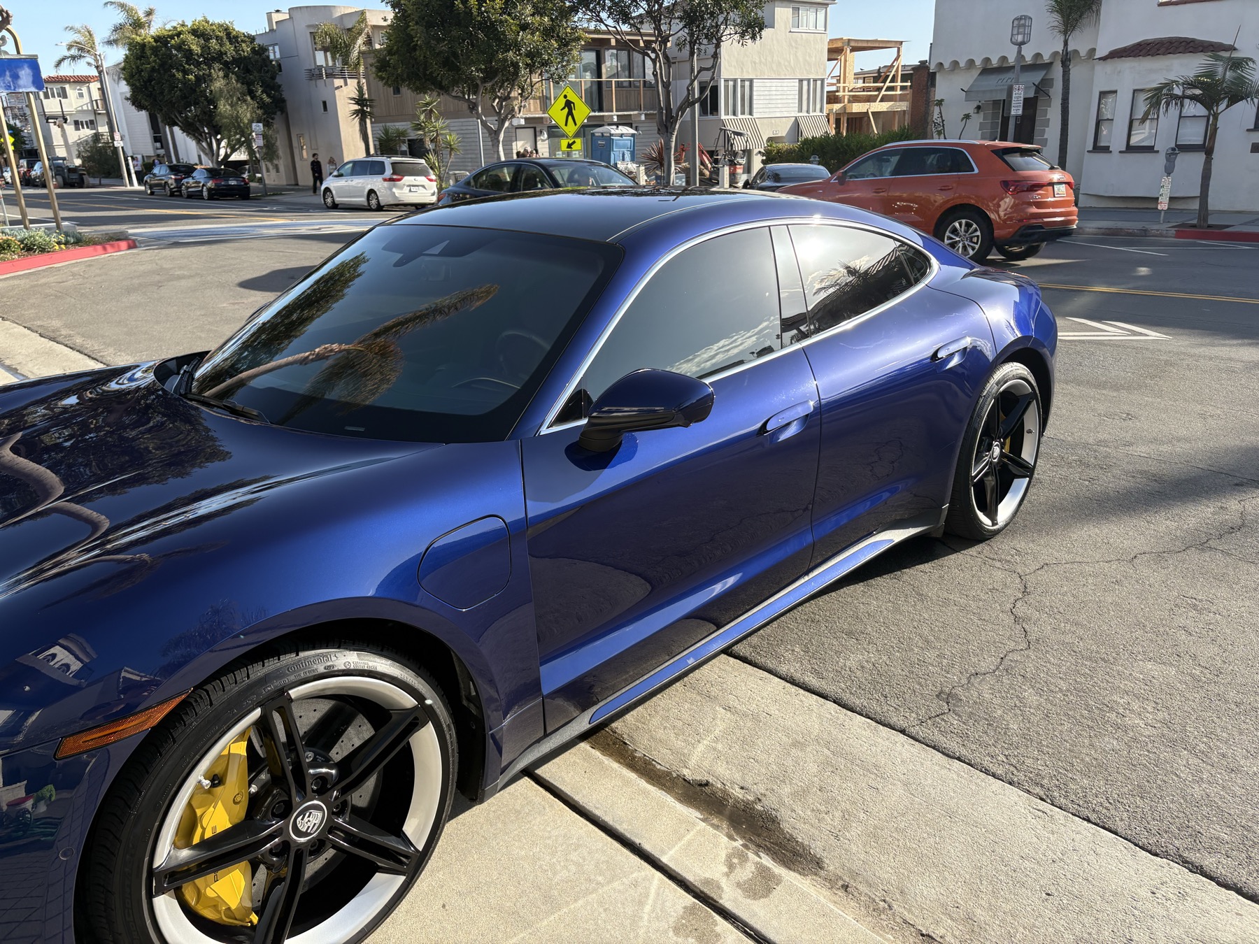 Blue Porsche side profile after detailing